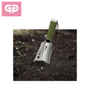Gp — Pala de excavación multiusos inox insertada en terreno.